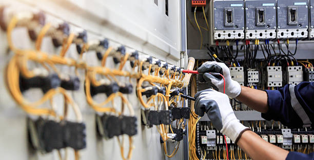 Professional Electrician technician working in Goodwater, AL